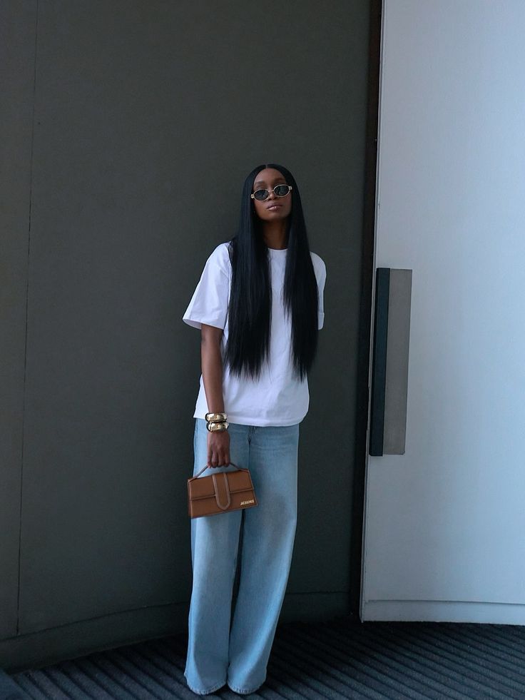 15 Stunning Black Women's Summer Outfits That'll Turn Heads (You Won't Believe #7!) - Elegance in Denim: The Classic White Tee 1