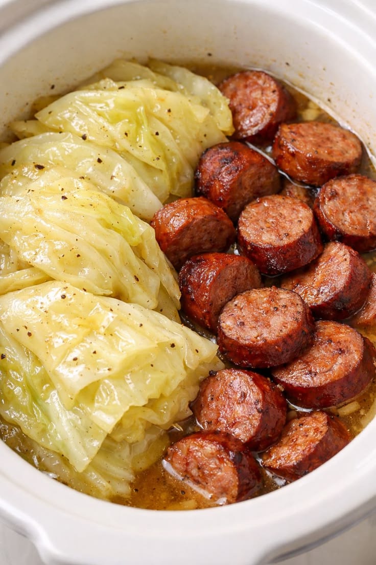 14 All-Day Crockpot Recipes That Will Make Dinner a Breeze (You Won't Believe #15!) - Savory Cabbage and Sausage Delight 1