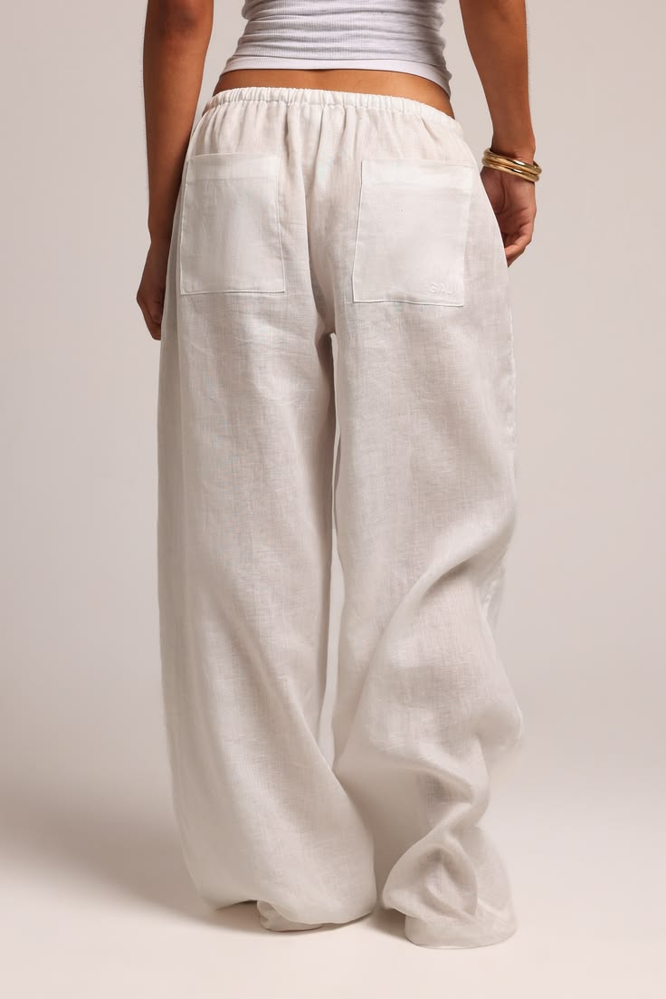 20 Stunning White Linen Pants Styles That Will Keep You Cool This Summer! - Sporty Luxe 1