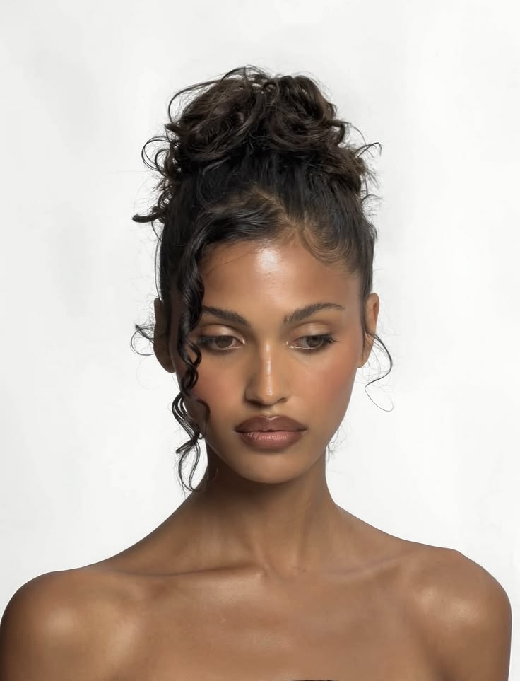 20 Chic Bridesmaid Hairstyles for Black Women (Wait Until You See #12!) - 10. Elegant Low Bun 1