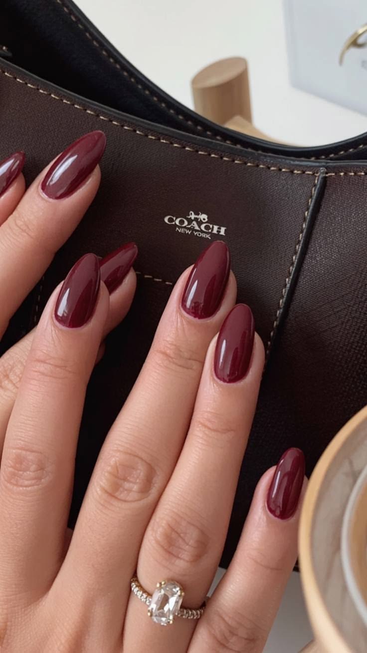 20 Classy Acrylic Nails That Look Like Quiet Luxury (You’ll Want to Copy #12!) - 13. Glossy Merlot Almonds with Designer-Bag Mood 1