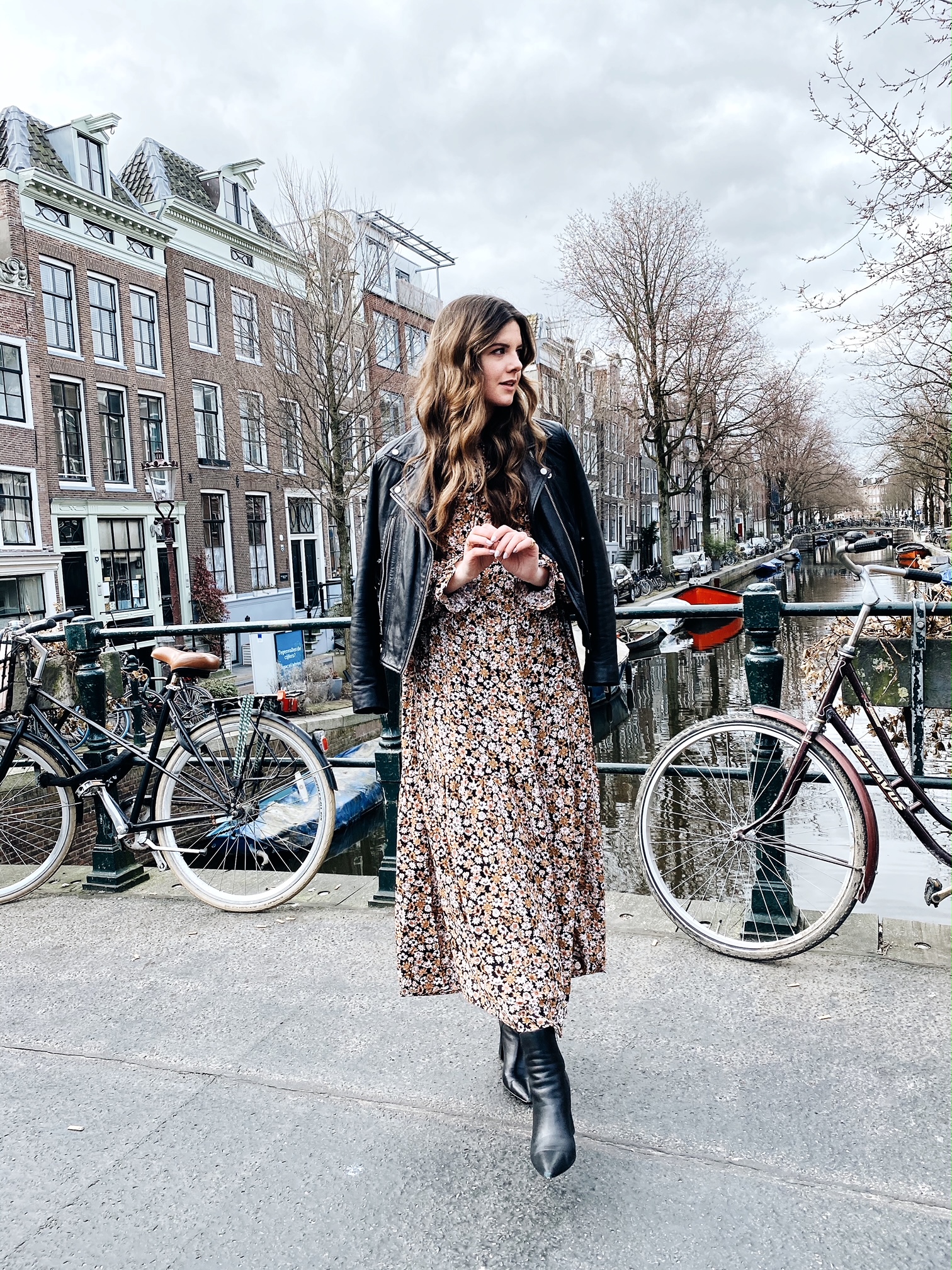 20 Jaw-Dropping Maxi Dress Outfit Ideas You Need to Try This Summer! - Edgy Floral Maxi with a Leather Jacket 1