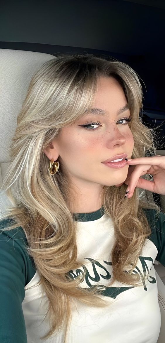 20 Layered Hairstyles That Instantly Add Volume and Movement (Wait Until You See #20!) - 12. The Voluminous Face-Frame Blowout 1