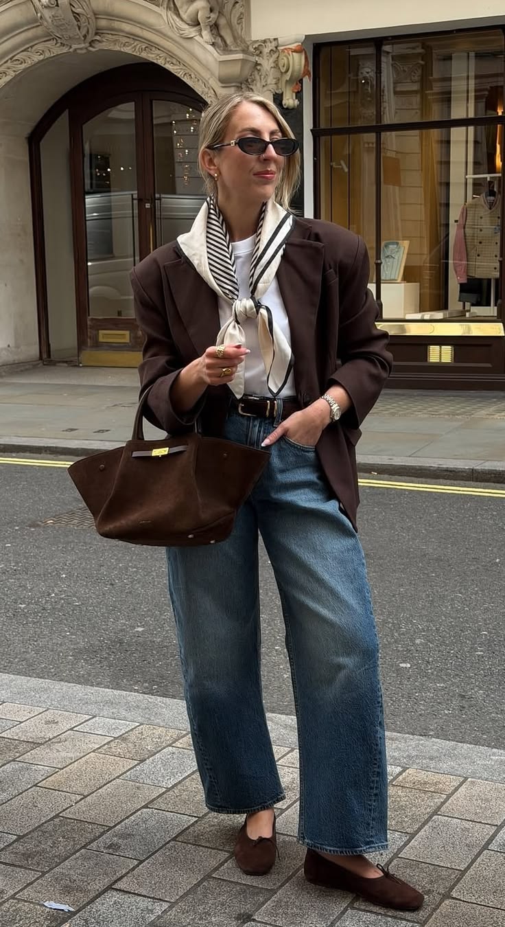20 Milan Street Style Looks That Prove Italian Women Own Fall Fashion - 15. Silk Scarf, Brown Blazer, and Easy Blue Jeans 1