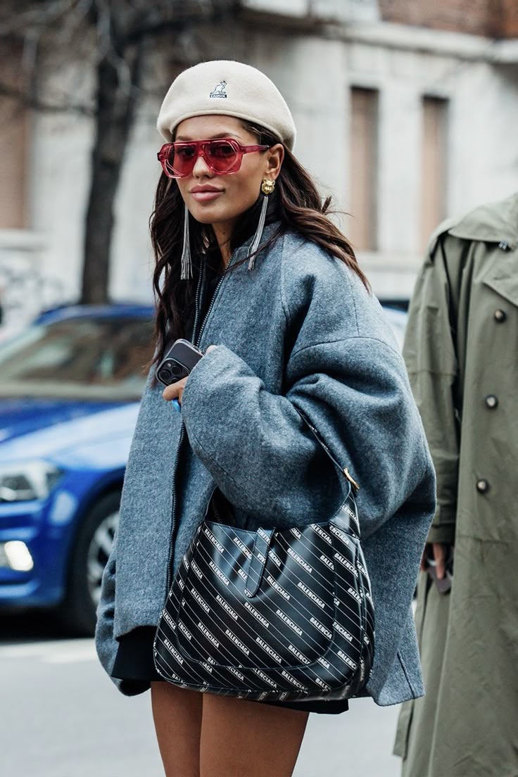 20 Milan Street Style Looks That Prove Italian Women Own Fall Fashion - 17. Oversized Gray Coat, Cream Beret, and Red Glasses 1