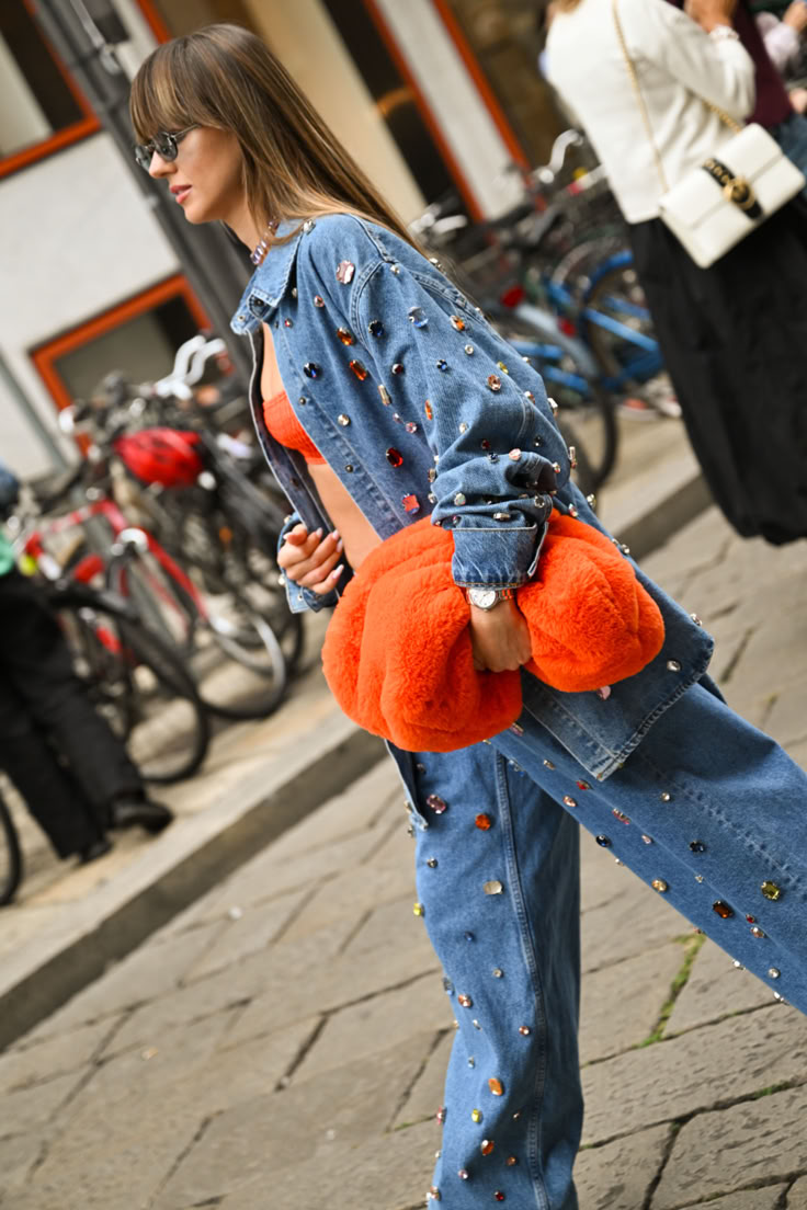 20 Milan Street Style Looks That Prove Italian Women Own Fall Fashion - 8. Jeweled Denim with a Giant Orange Cloud Bag 1