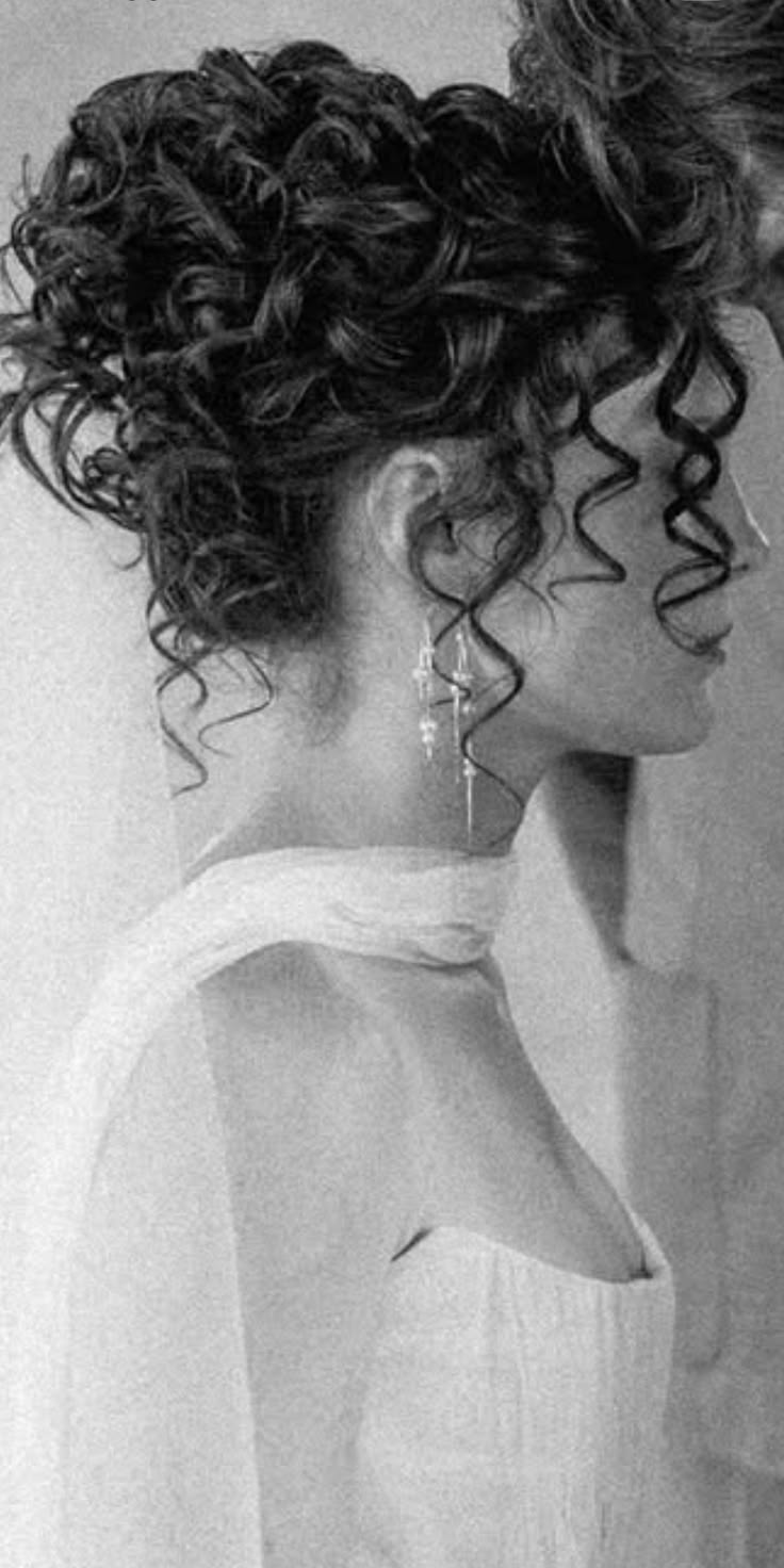 20 Stunning Curly Bridal Updos That Will Make You Feel Like the Belle of the Ball - 1. The Black-and-White Cloud of Curls 1