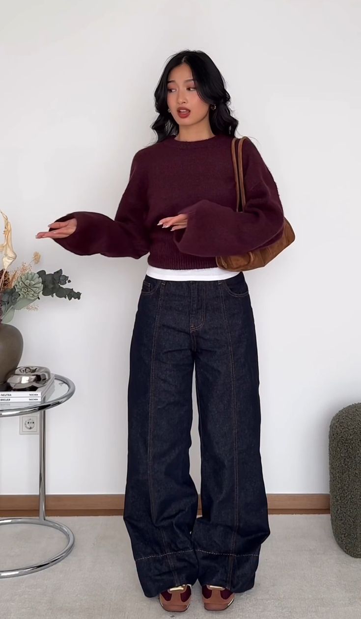 20 Sweater and Jeans Outfits That Make Casual Style Look Effortlessly Chic - 6. Burgundy Knit with Dark Denim and a Vintage Shoulder Bag 1
