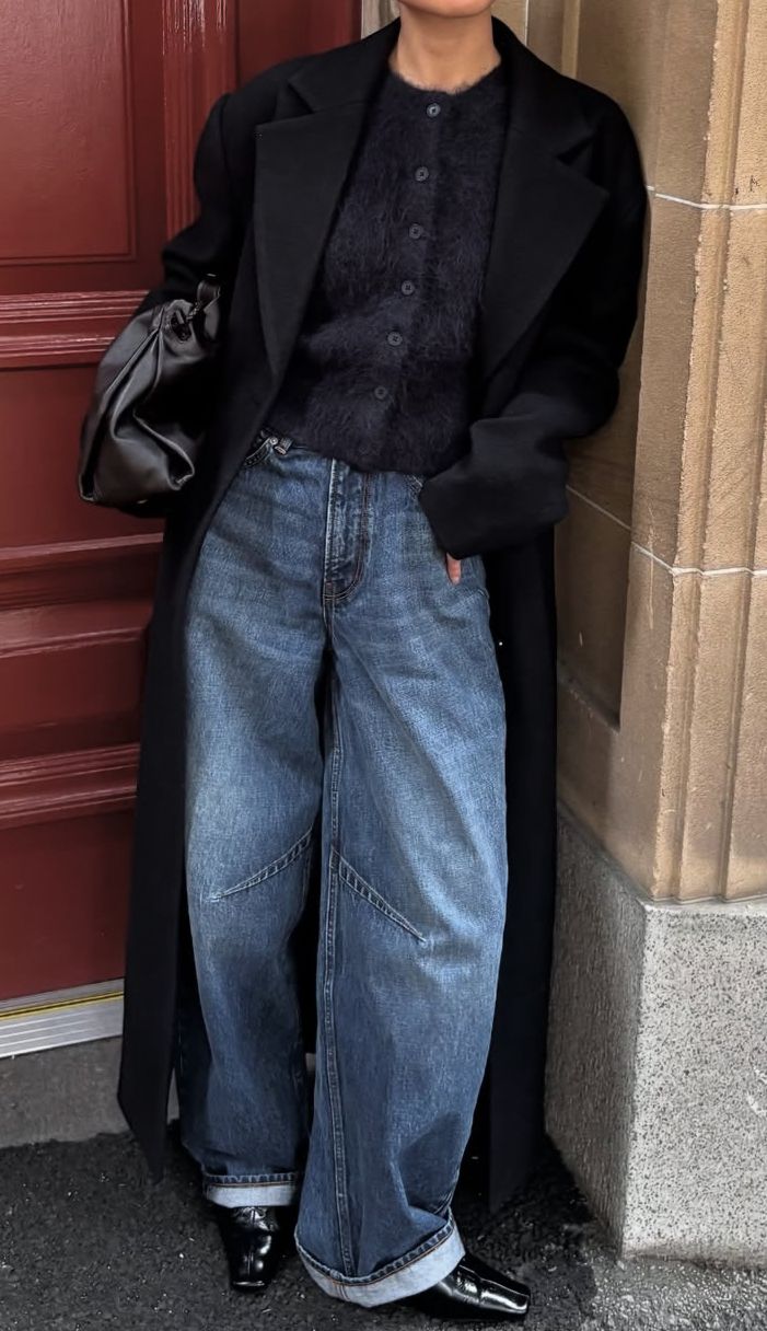 20 Winter Street Style Outfits That Look Effortlessly Cool (Even on the Coldest Days!) - 8. Black Coat, Fuzzy Cardigan, and Oversized Jeans 1