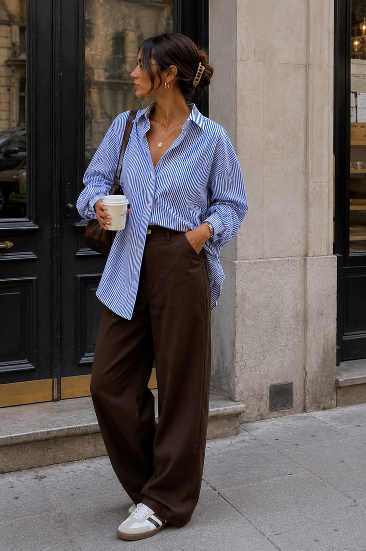 20 Blue Shirt Outfits That Make Casual Style Look Effortlessly Chic (#9 Is a Total Game-Changer!) - 11. Blue Stripes and Chocolate Brown Trousers 1