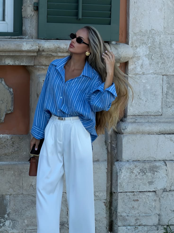 20 Blue Shirt Outfits That Make Casual Style Look Effortlessly Chic (#9 Is a Total Game-Changer!) - 13. Bold Blue Stripes with White Wide-Leg Pants 1
