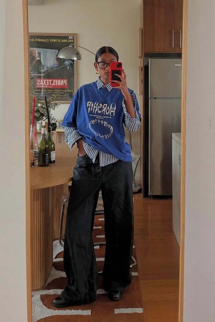 20 Blue Shirt Outfits That Make Casual Style Look Effortlessly Chic (#9 Is a Total Game-Changer!) - 8. Graphic Blue Tee over a Striped Shirt 1