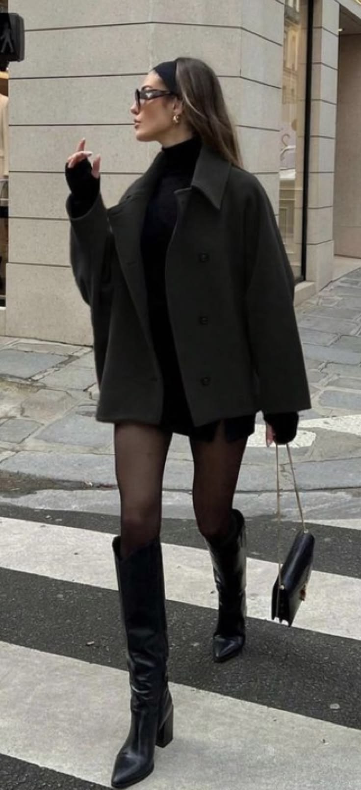 20 Dark Feminine Outfits That Make Looking Dangerous So Chic - 17. Oversized Coat, Mini Shorts, and Tall Boots 1