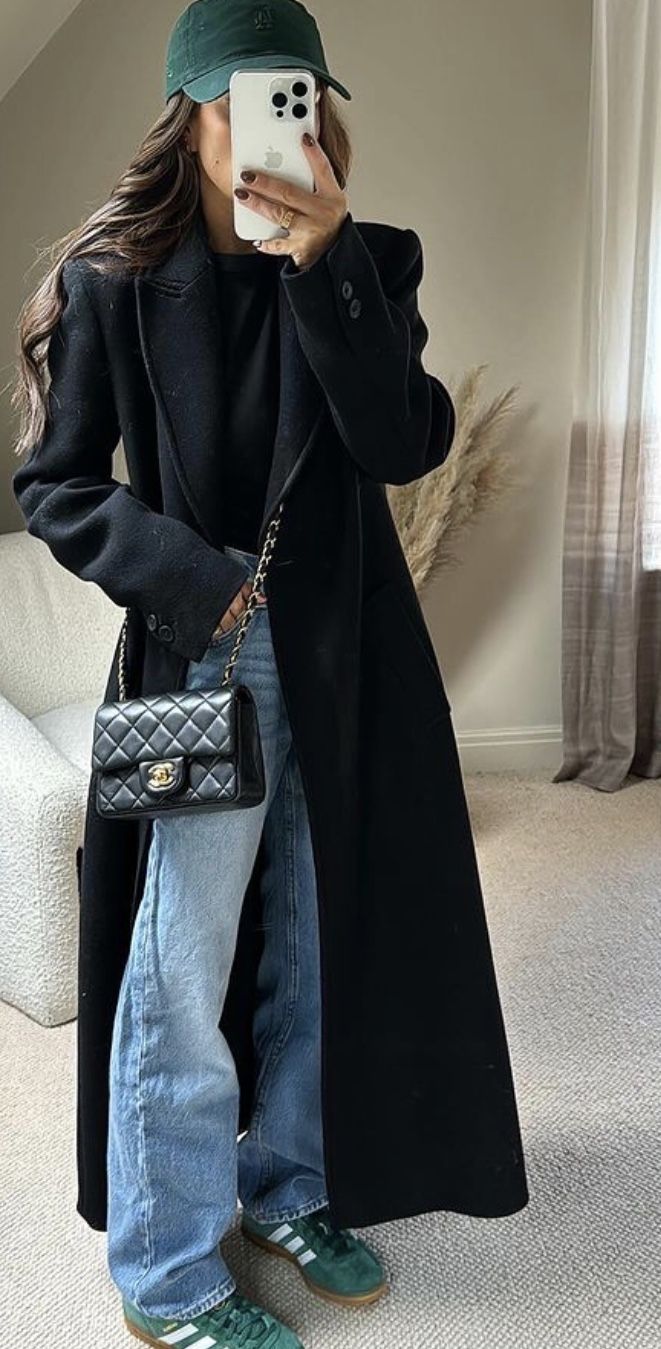 20 Luxury Winter Street Style Outfits That Look Straight Out of a Fashion Editorial - 12. The Long Black Coat with Green Sneaker Energy 1