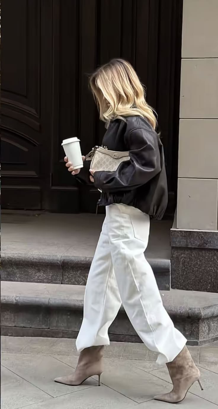 20 Luxury Winter Street Style Outfits That Look Straight Out of a Fashion Editorial - 17. Black Leather Bomber with White Trousers 1