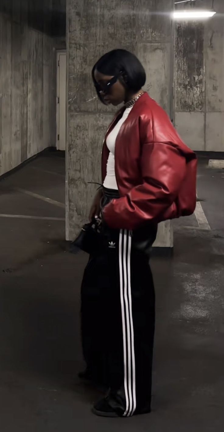 20 Red Leather Jacket Baddie Outfits That Bring Instant Main-Character Energy - 14. Red Bomber with Adidas-Style Track Pants 1