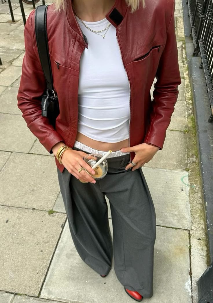 20 Red Leather Jacket Outfits That Will Make Your Street Style Impossible to Ignore - 10. Red Leather with Gray Trousers and Red Shoes 1