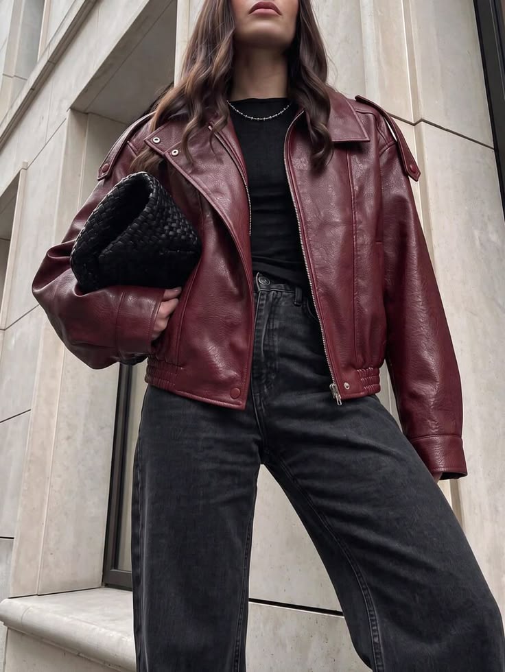 20 Red Leather Jacket Outfits That Will Make Your Street Style Impossible to Ignore - 18. Burgundy Jacket and Textured Black Clutch 1