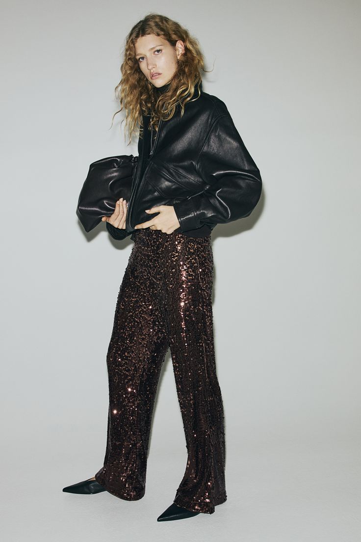 20 Sequin Trouser Outfits That Guarantee a Show-Stopping Christmas Entrance - 19. Bronze Sequins with a Black Leather Jacket 1