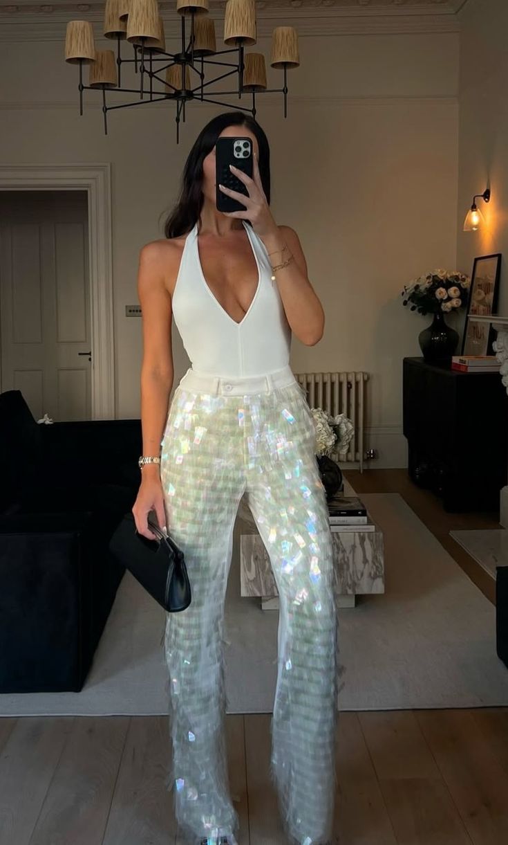 20 Sequin Trouser Outfits That Guarantee a Show-Stopping Christmas Entrance - 8. Iridescent Trousers with a White Halter Top 1
